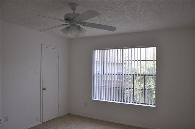 5630 Spring Valley Road, Unit 17A Dallas, TX 75254 - Photo 7 of 14 an empty room with a window