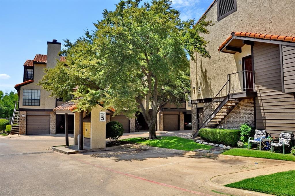 5630 Spring Valley Road, Unit 17A Dallas, TX 75254 - Photo 10 of 14 front view of a house with a street
