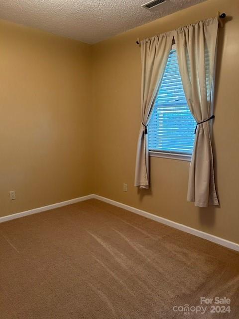 19940 Oak Leaf Circle Cornelius, NC 28031 - Photo 6 of 21 a view of an empty room with wooden floor