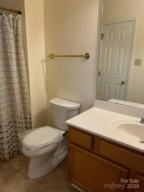 19940 Oak Leaf Circle Cornelius, NC 28031 - Photo 8 of 21 a bathroom with a toilet and a sink