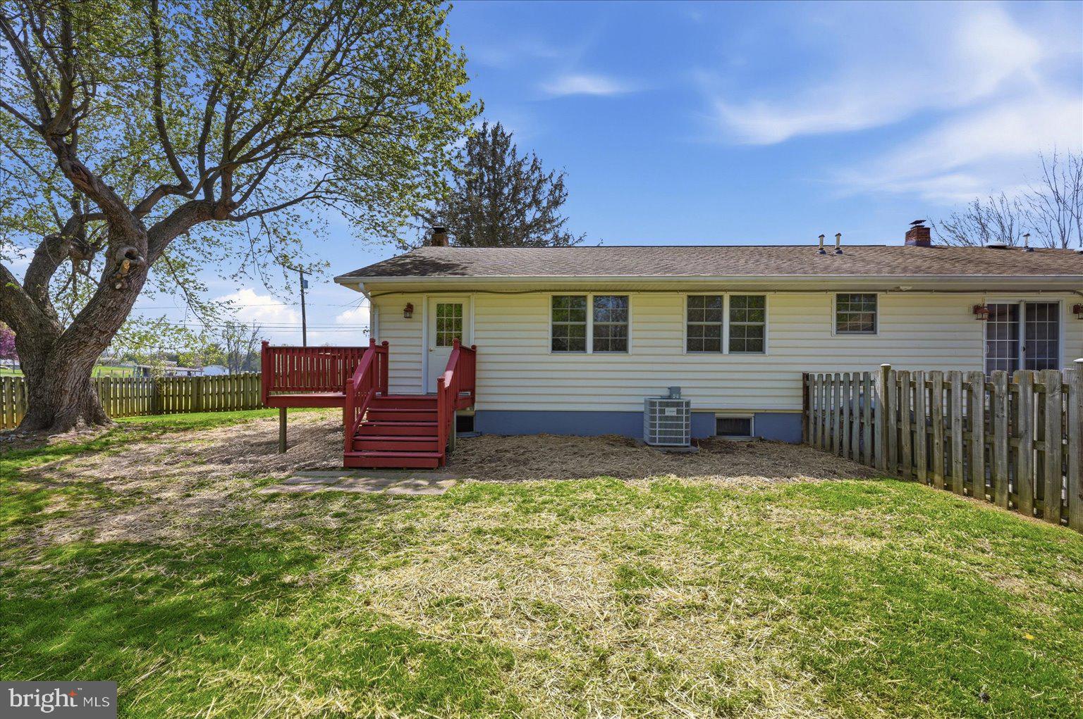 3093 Old Leetown Pike Ranson, WV 25438 - Photo 67 of 85 Fenced pet yard with doggie door