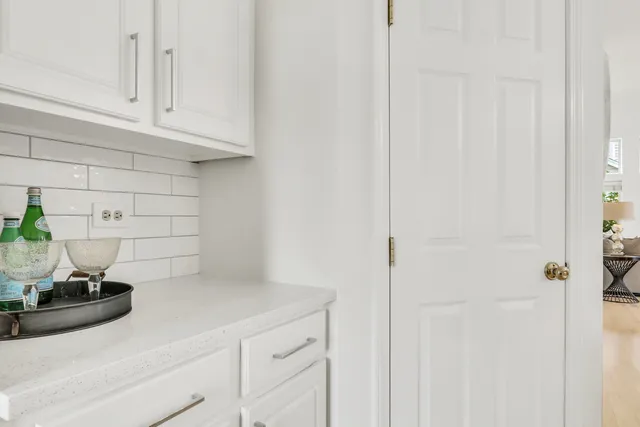a kitchen with stainless steel appliances a refrigerator and a stove