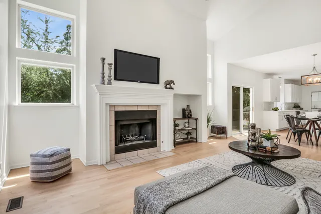 a bathroom with a sink a mirror and a shower