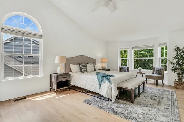 a bathroom with a sink vanity and a mirror