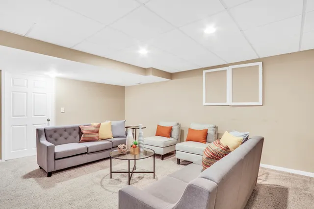 a view of a room with wooden walls