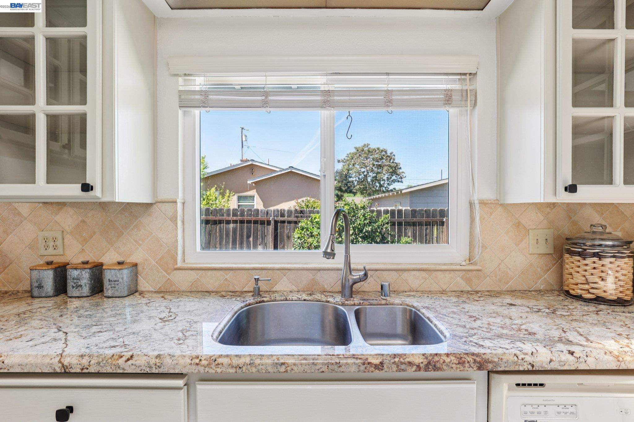 1113 Tokay Common Livermore, CA 94550 - Photo 15 of 30 a kitchen with a sink and a window