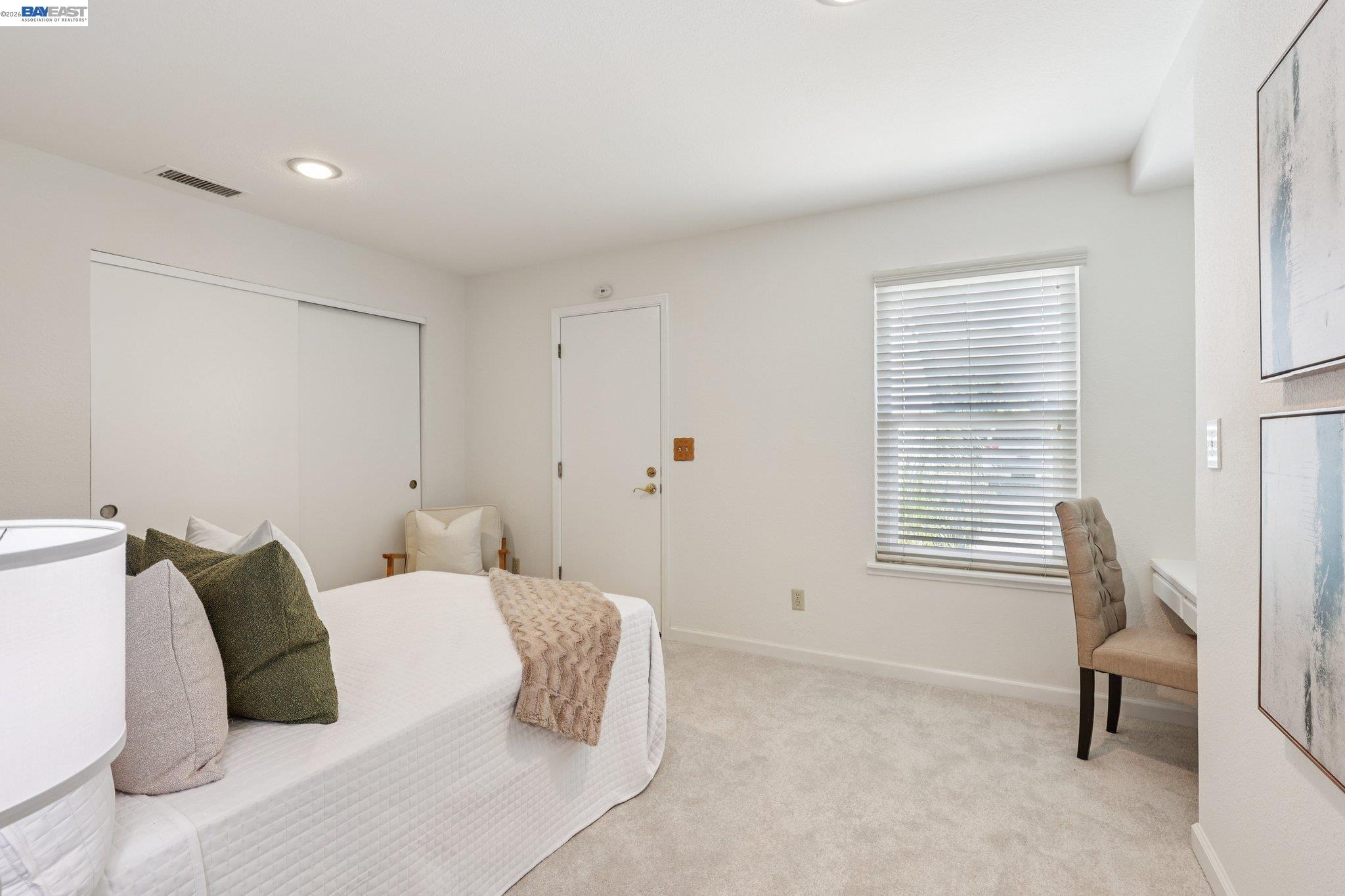 1113 Tokay Common Livermore, CA 94550 - Photo 17 of 30 a bedroom with a bed and a window
