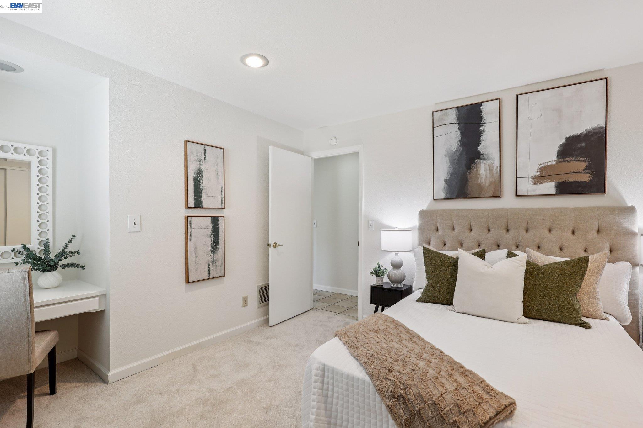 1113 Tokay Common Livermore, CA 94550 - Photo 18 of 30 a bedroom with a bed and a painting on the wall
