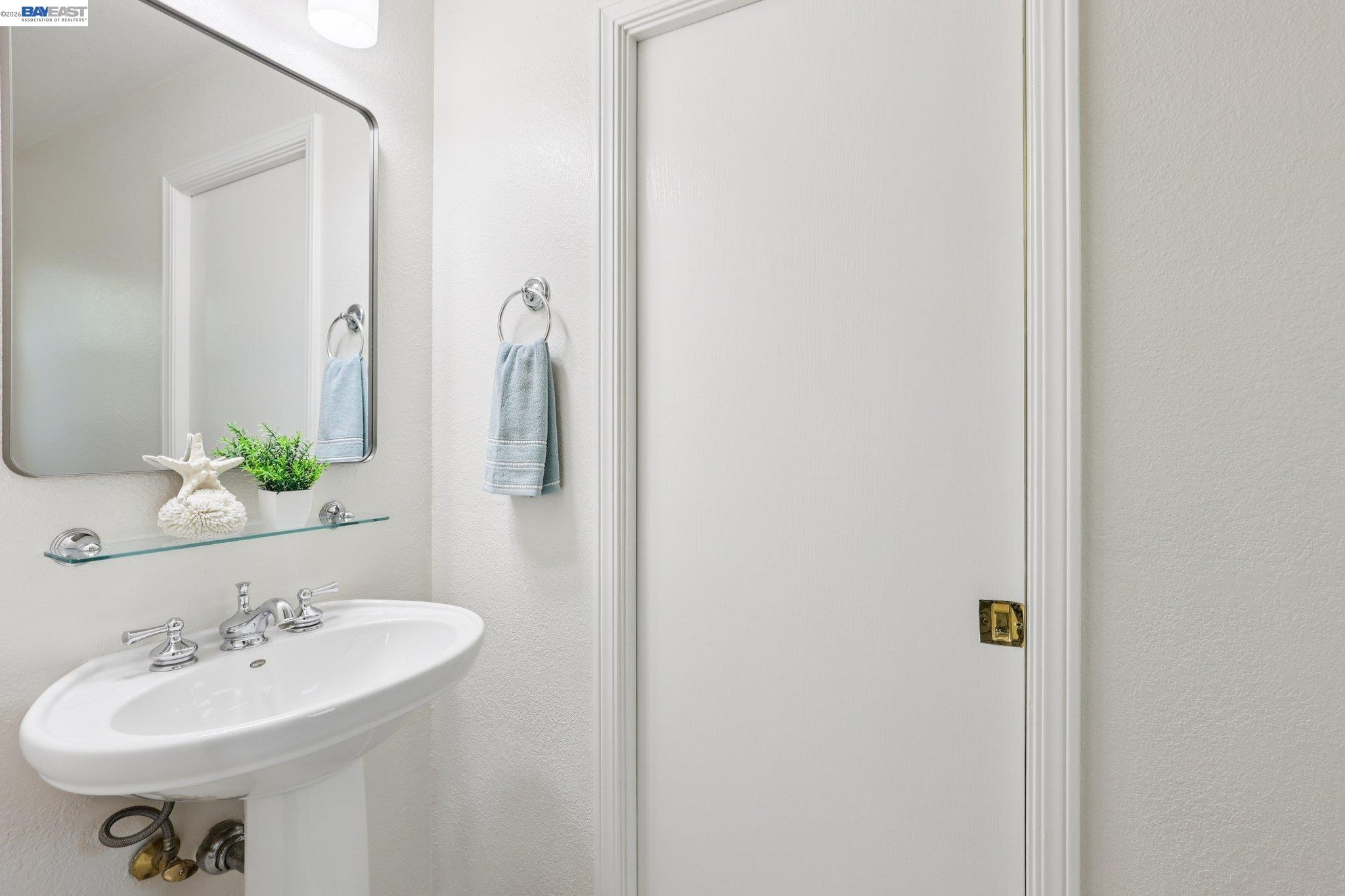 1113 Tokay Common Livermore, CA 94550 - Photo 24 of 30 a bathroom with a sink and a mirror