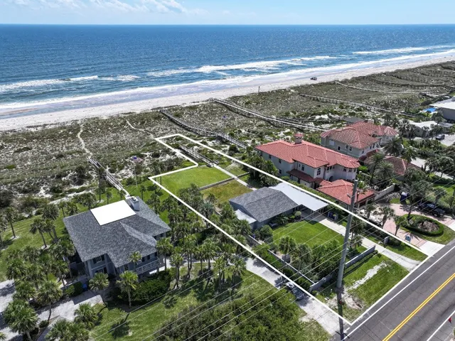 a view of a lake with a house