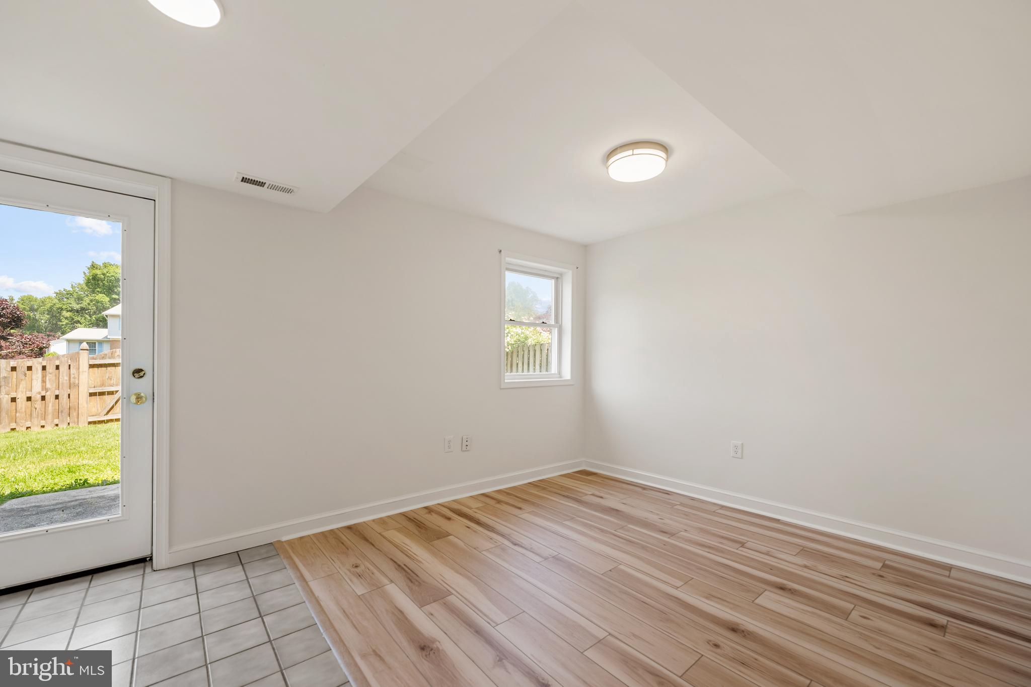6800 Seton Court Springfield, VA 22152 - Photo 34 of 51 wooden floor in an empty room with a window