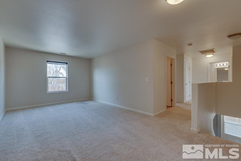 2924 Bryan Street Reno, NV 89503 - Photo 12 of 23 an empty room with windows and closet
