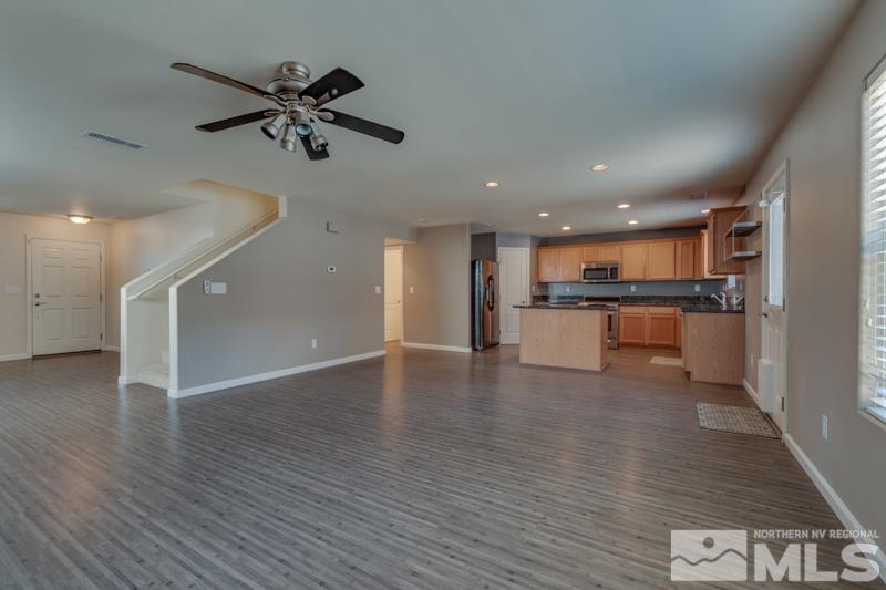 2924 Bryan Street Reno, NV 89503 - Photo 7 of 23 a view of kitchen with cabinets wooden floor and stainless steel appliances