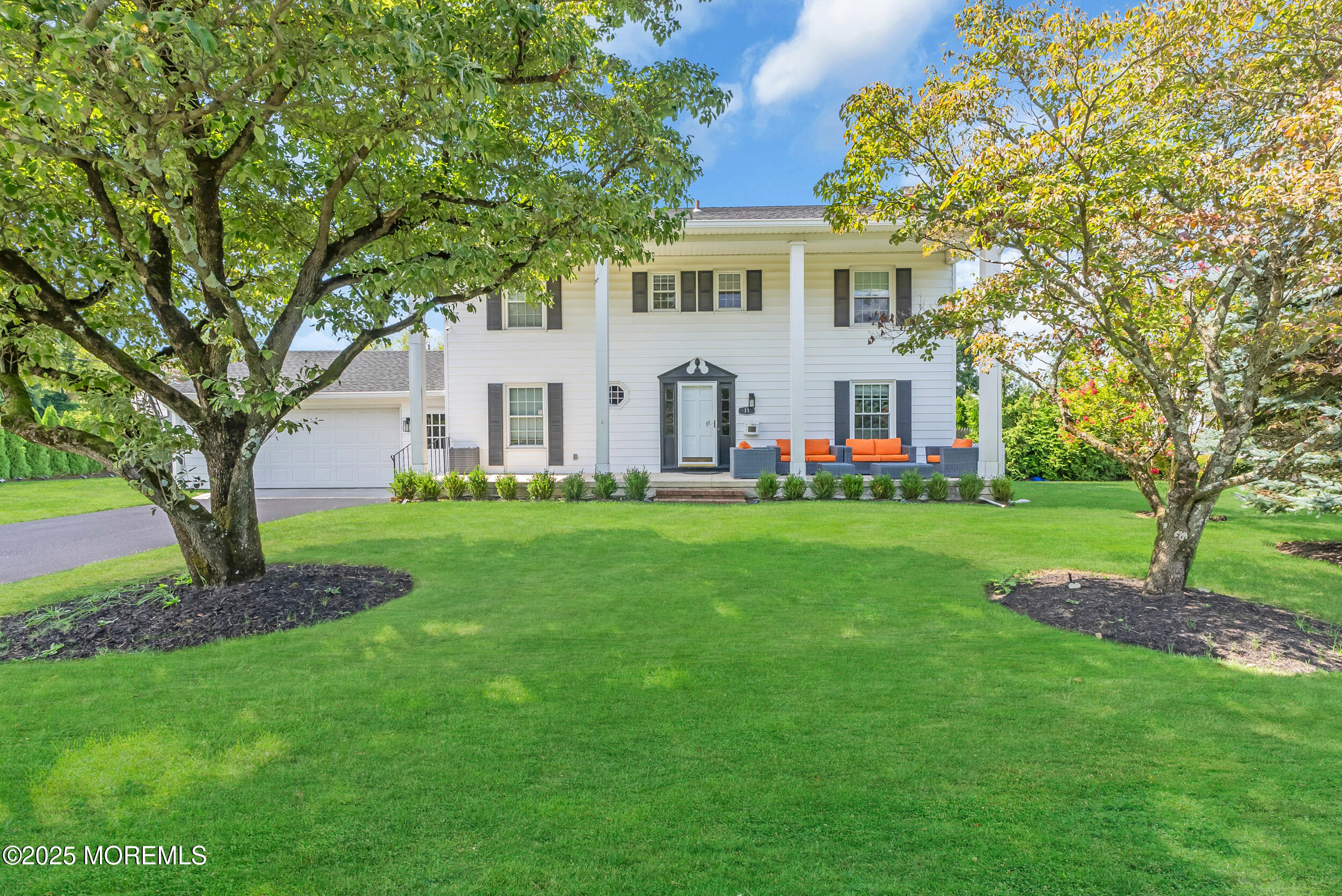 11 Pinewood Avenue West Long Branch, NJ 07764 - Photo 1 of 39 a front view of house with yard and green space