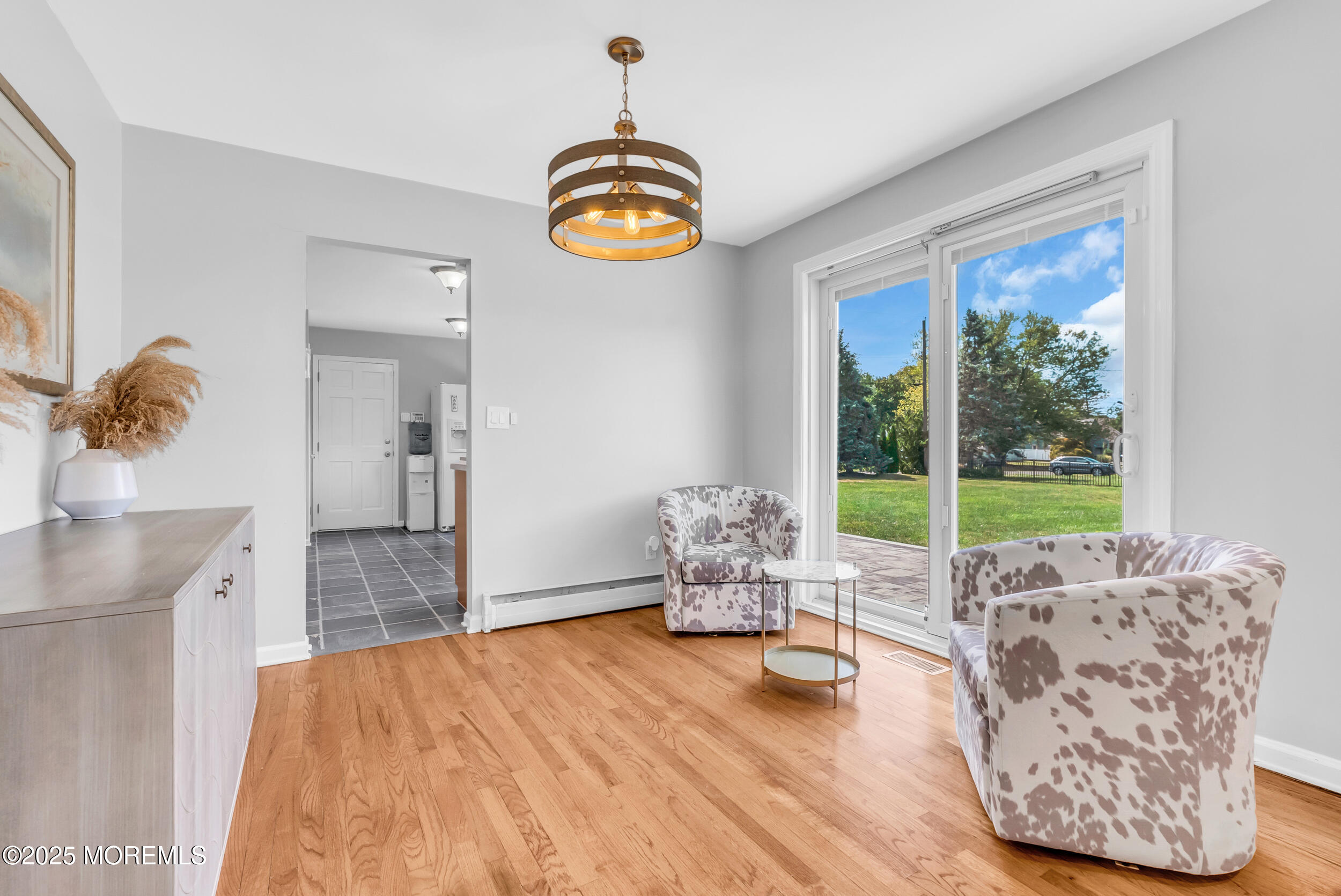 11 Pinewood Avenue West Long Branch, NJ 07764 - Photo 13 of 39 a living room with furniture and a large window