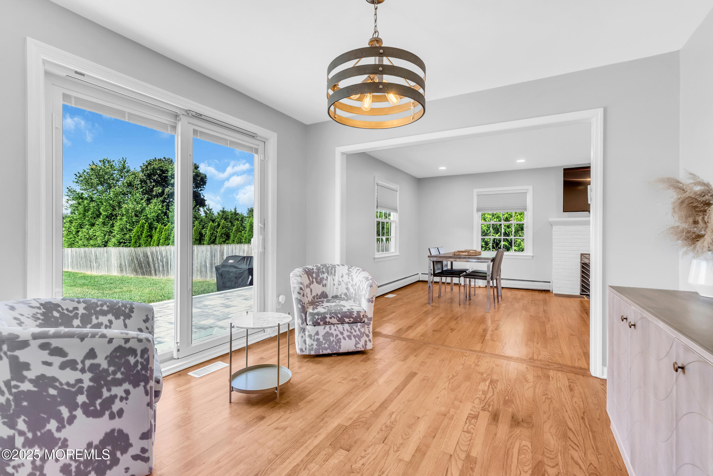 11 Pinewood Avenue West Long Branch, NJ 07764 - Photo 14 of 39 a living room with furniture and a large window