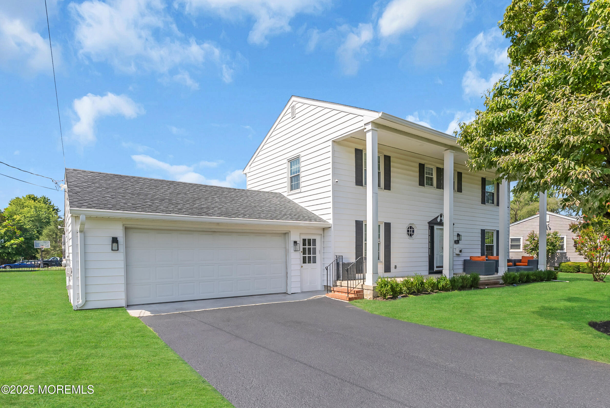 11 Pinewood Avenue West Long Branch, NJ 07764 - Photo 2 of 39 a front view of house with yard