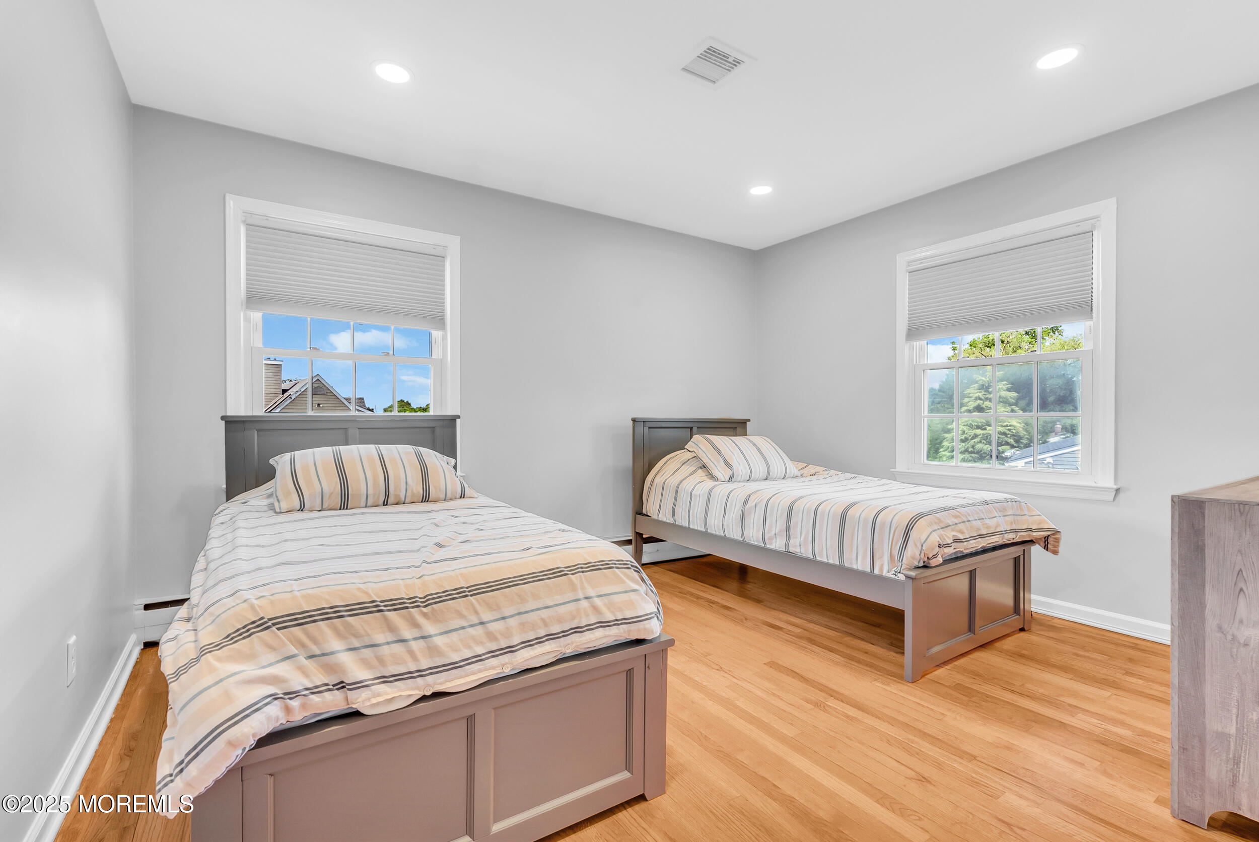 11 Pinewood Avenue West Long Branch, NJ 07764 - Photo 27 of 39 a bedroom with a bed and a window