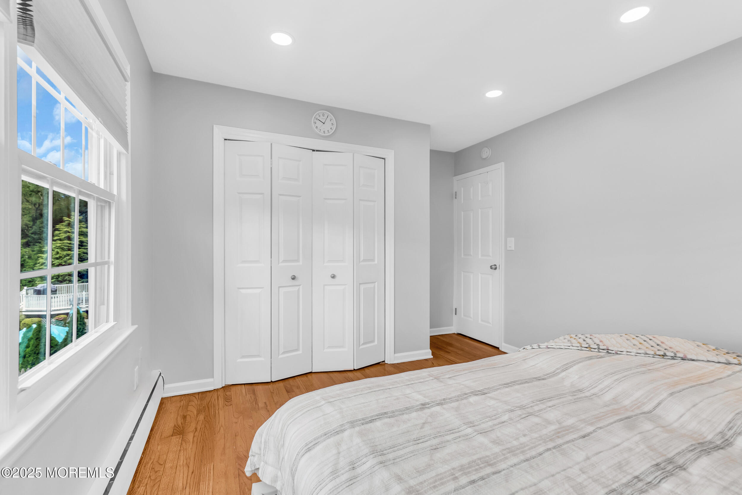 11 Pinewood Avenue West Long Branch, NJ 07764 - Photo 30 of 39 a bedroom with a bed and a window