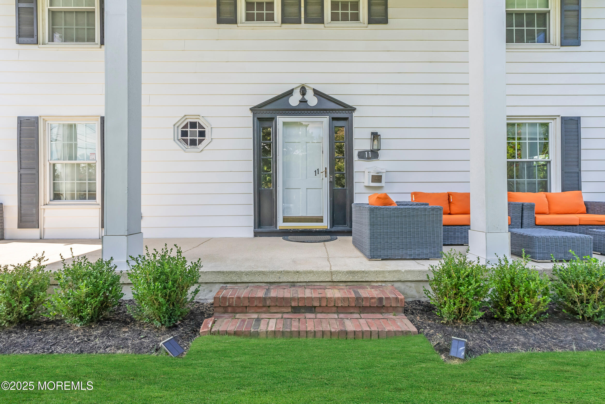 11 Pinewood Avenue West Long Branch, NJ 07764 - Photo 3 of 39 a front view of a house with garden