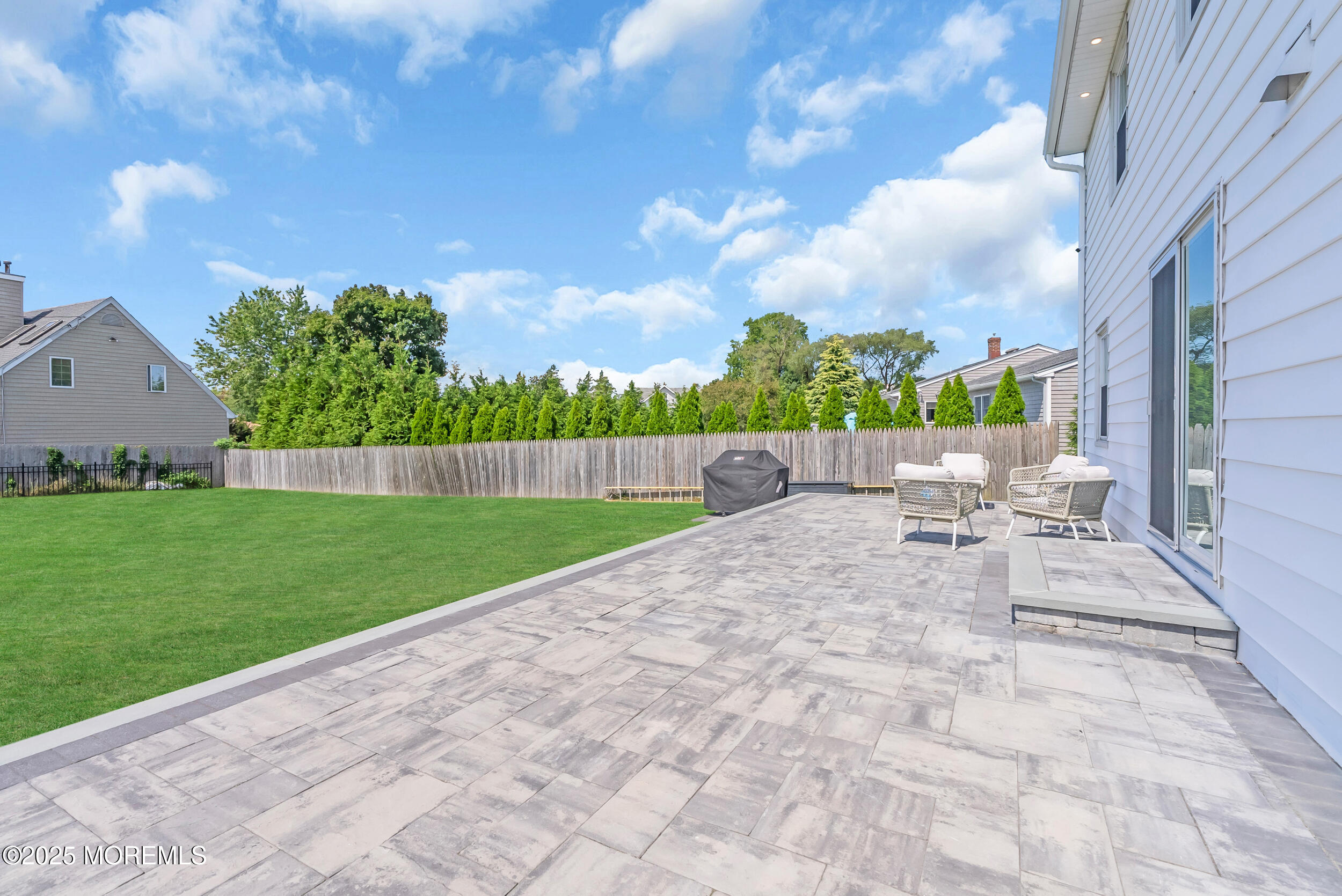 11 Pinewood Avenue West Long Branch, NJ 07764 - Photo 34 of 39 a view of yard with swimming pool and sitting area