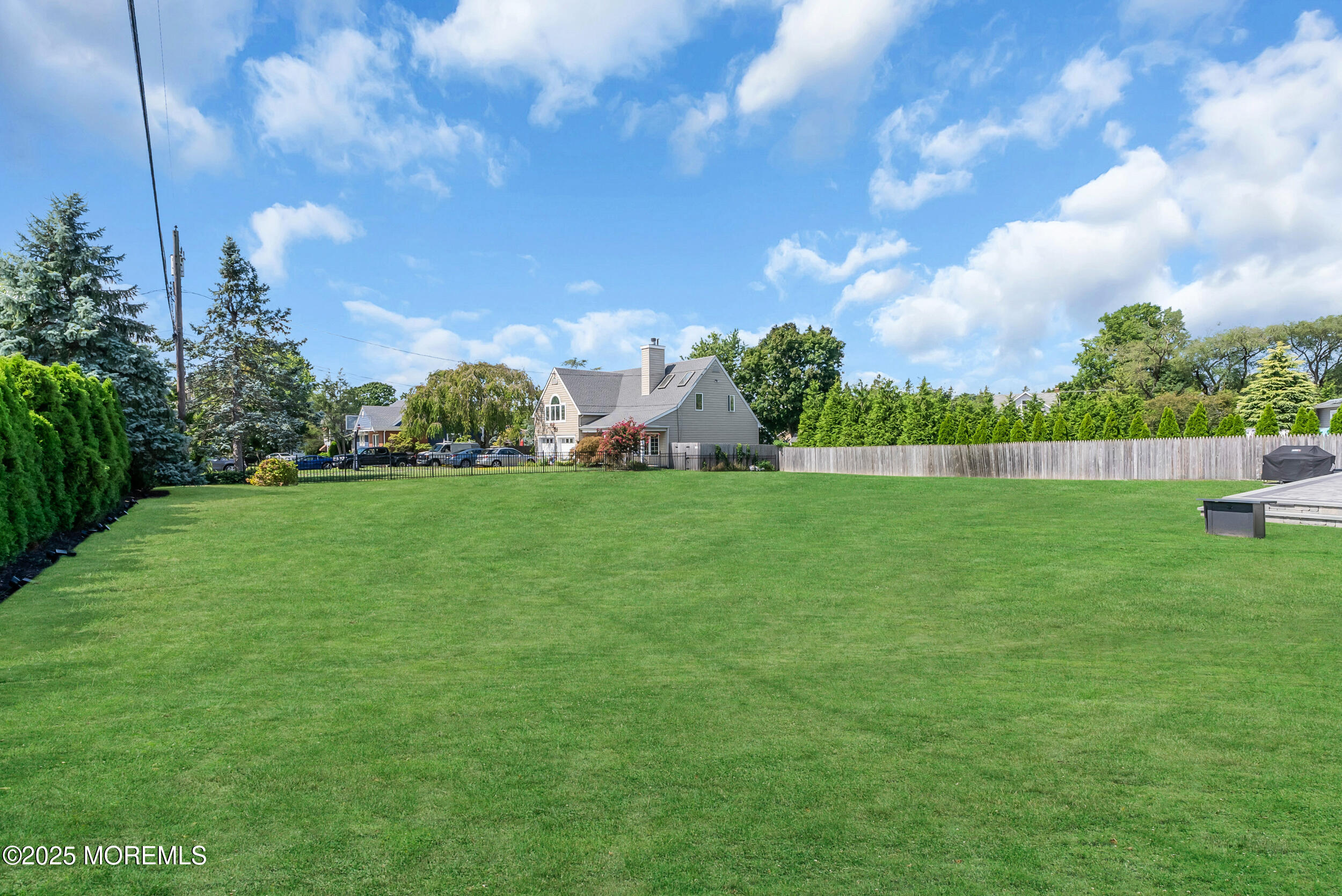 11 Pinewood Avenue West Long Branch, NJ 07764 - Photo 38 of 39 a view of yard with swimming pool and green space