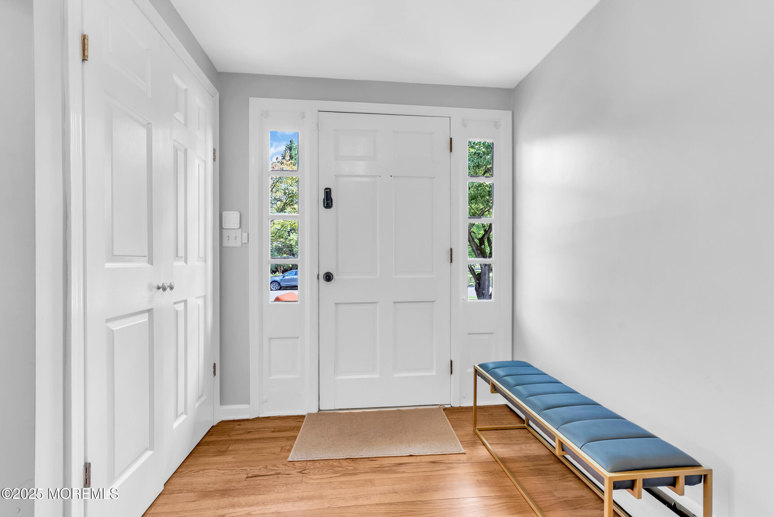 11 Pinewood Avenue West Long Branch, NJ 07764 - Photo 5 of 39 a view of room with hardwood floor and hallway