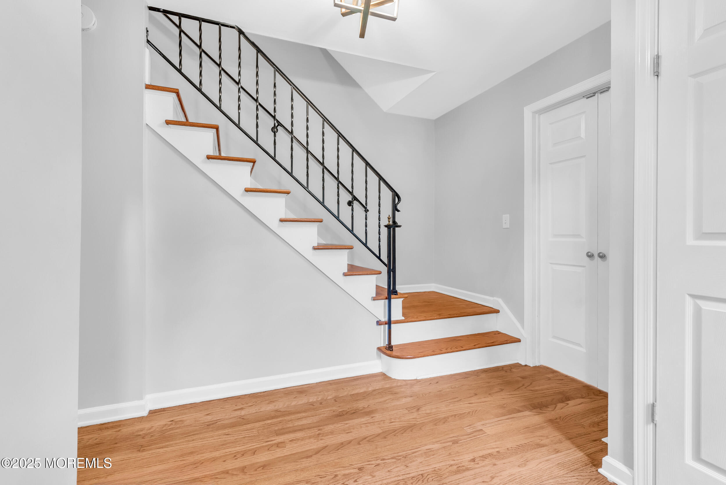 11 Pinewood Avenue West Long Branch, NJ 07764 - Photo 6 of 39 a view of entryway with wooden floor