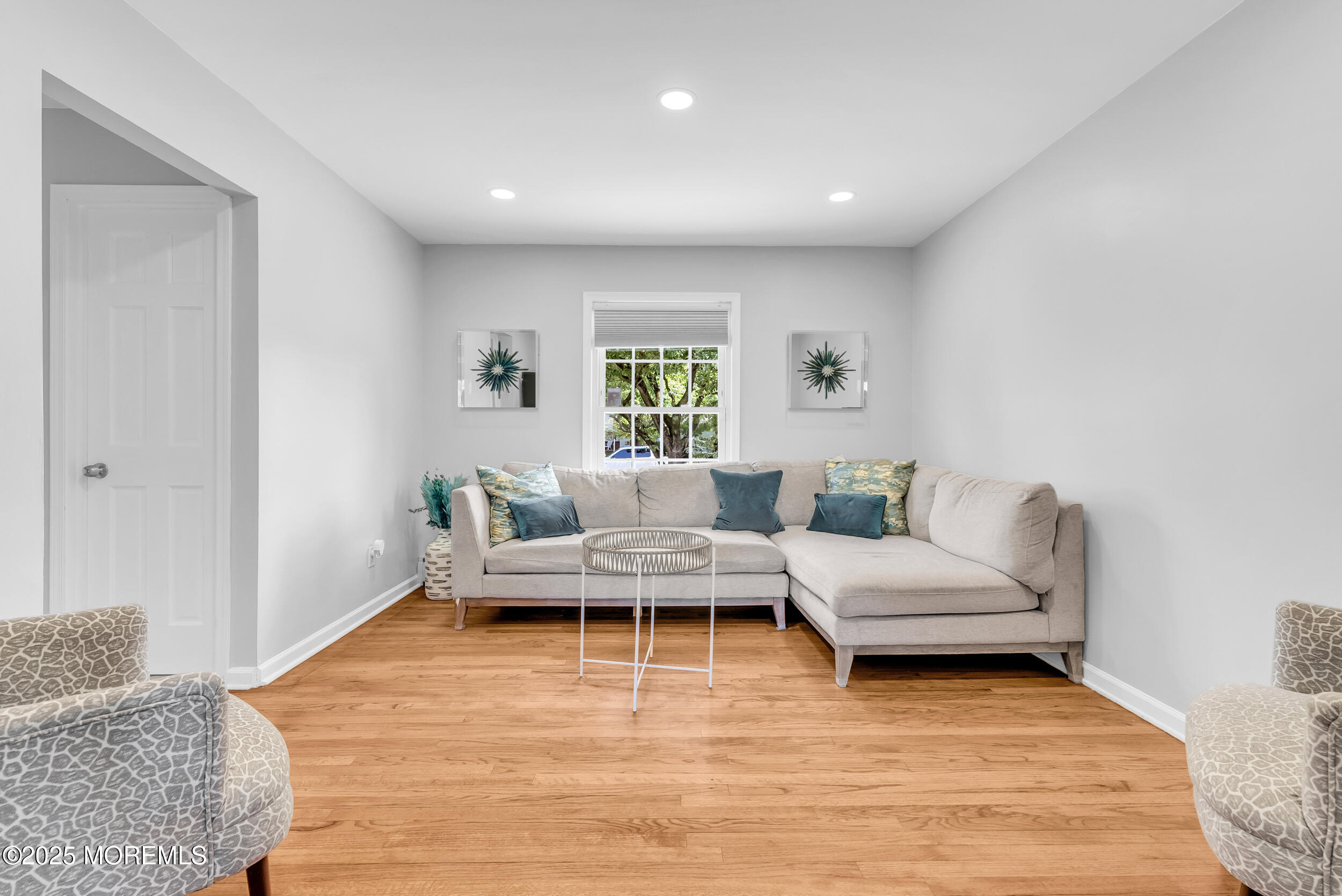 11 Pinewood Avenue West Long Branch, NJ 07764 - Photo 7 of 39 a living room with furniture and a rug