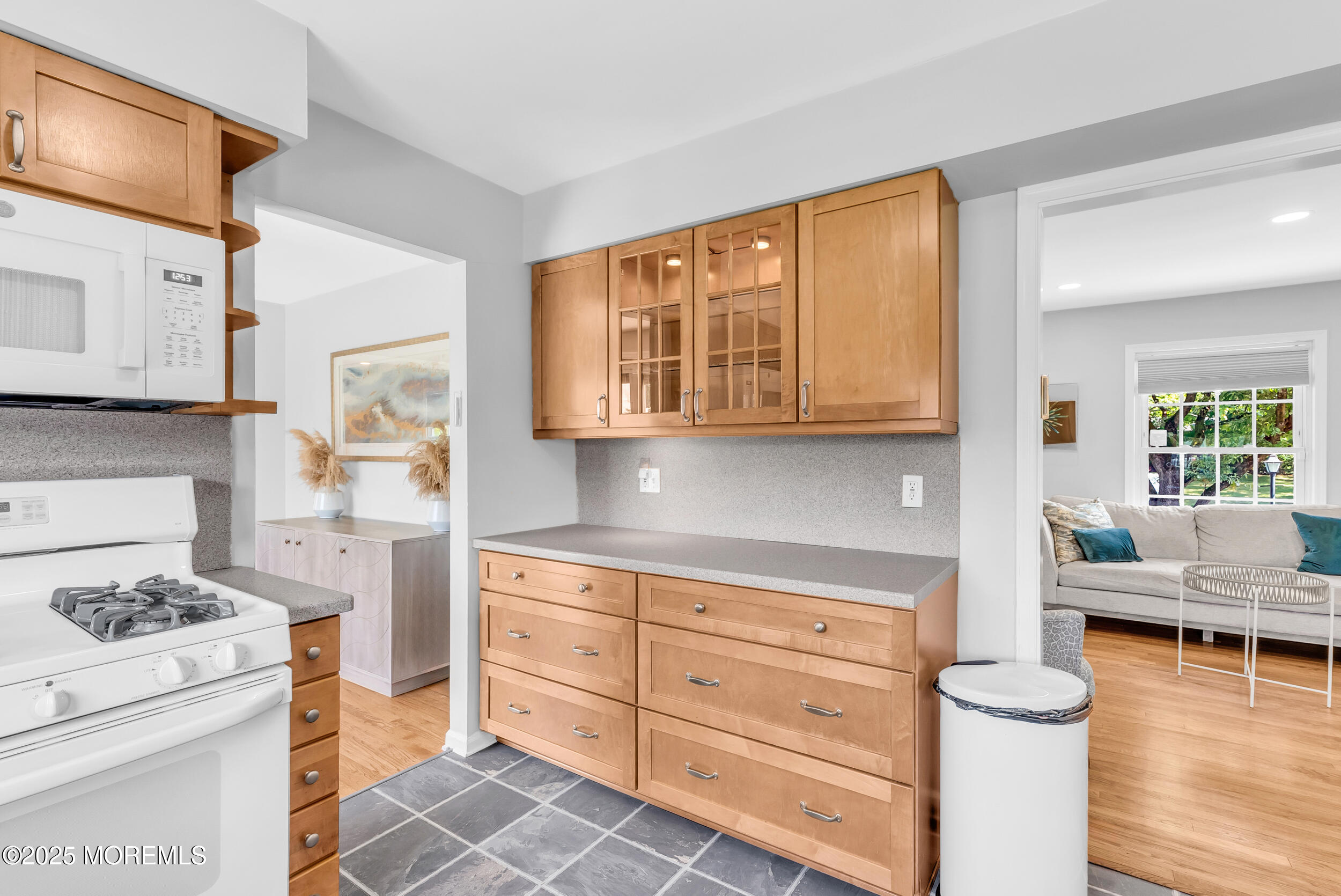 11 Pinewood Avenue West Long Branch, NJ 07764 - Photo 9 of 39 a kitchen with stainless steel appliances a stove a sink and a cabinets
