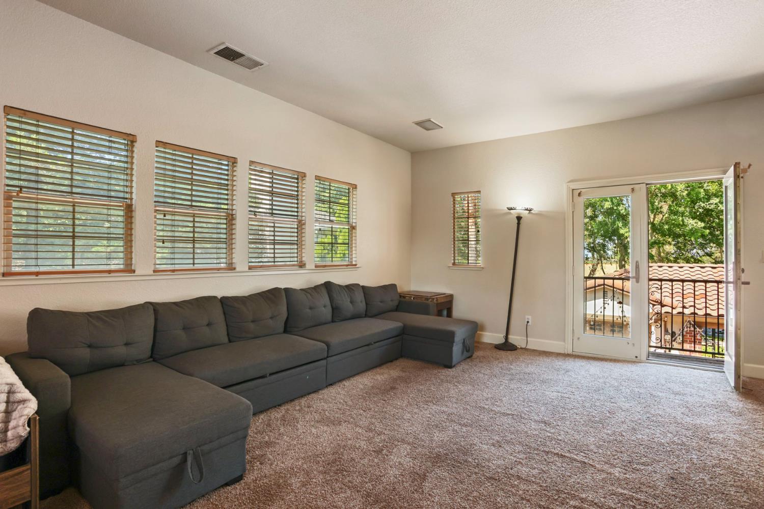 3044 Redbridge Road Tracy, CA 95377 - Photo 54 of 88 a living room with furniture and a large window