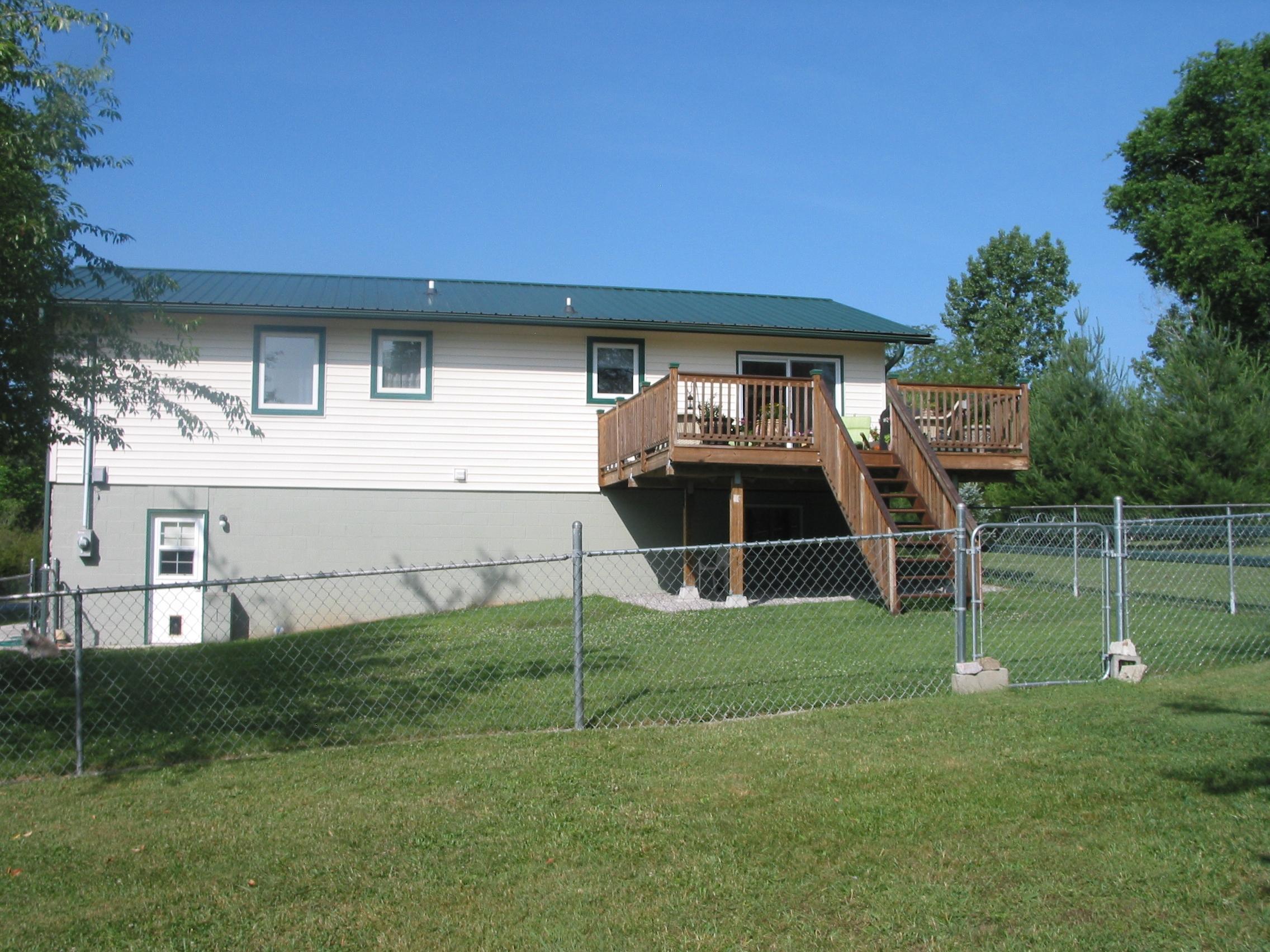 5100 Shipe Road Corryton, TN 37721 - Photo 21 of 32 Deck, fence and yard Shipe
