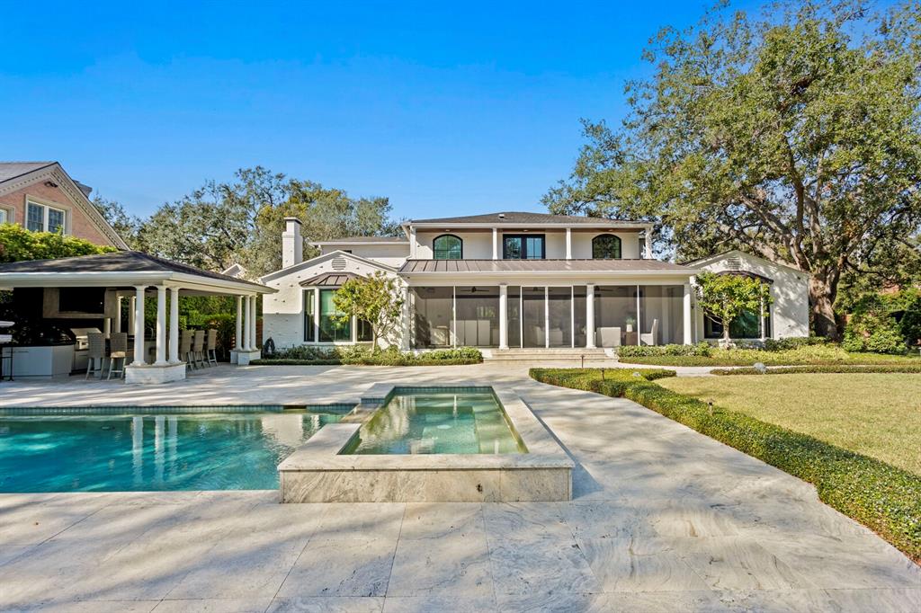 1002 South Frankland Road Tampa, FL 33629 - Photo 70 of 88 a front view of a house with swimming pool having outdoor seating