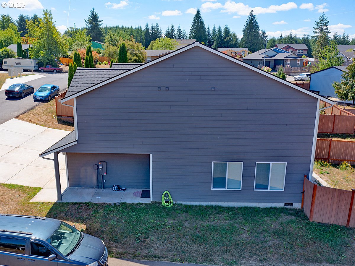 306 Oak Street Winlock, WA 98596 - Photo 11 of 35 a pathway of a house with a yard