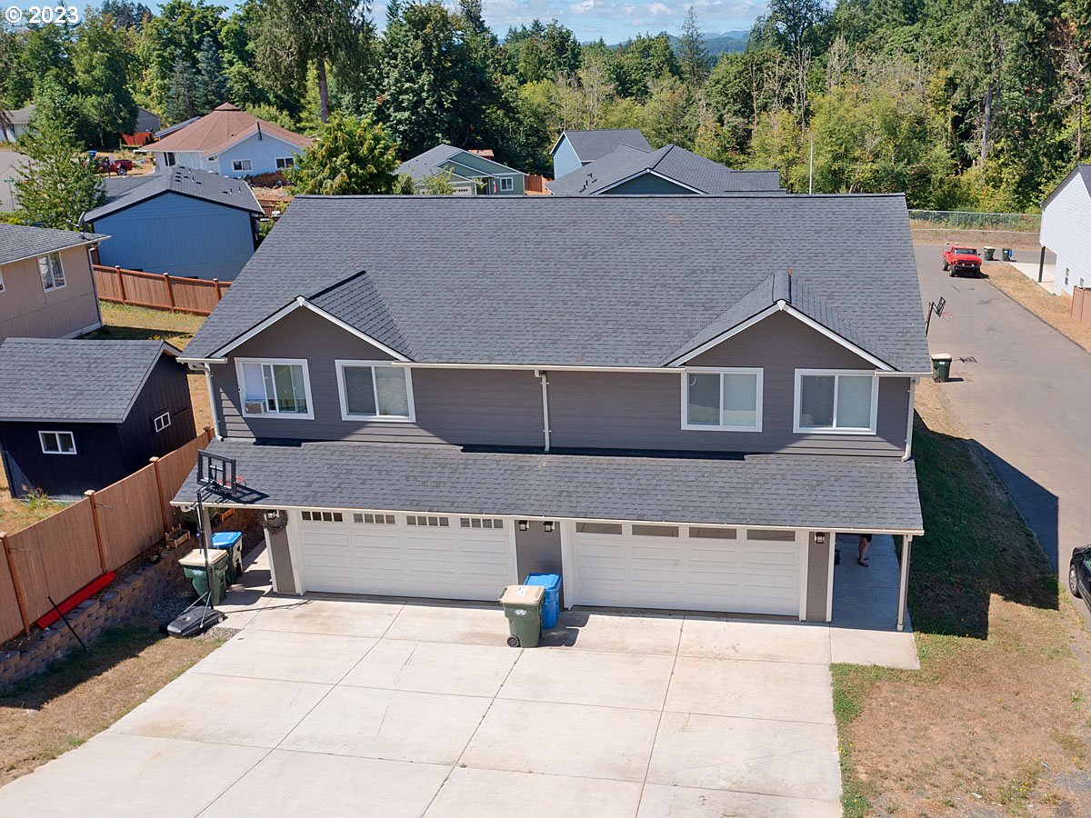 306 Oak Street Winlock, WA 98596 - Photo 2 of 35 an aerial view of a house with yard