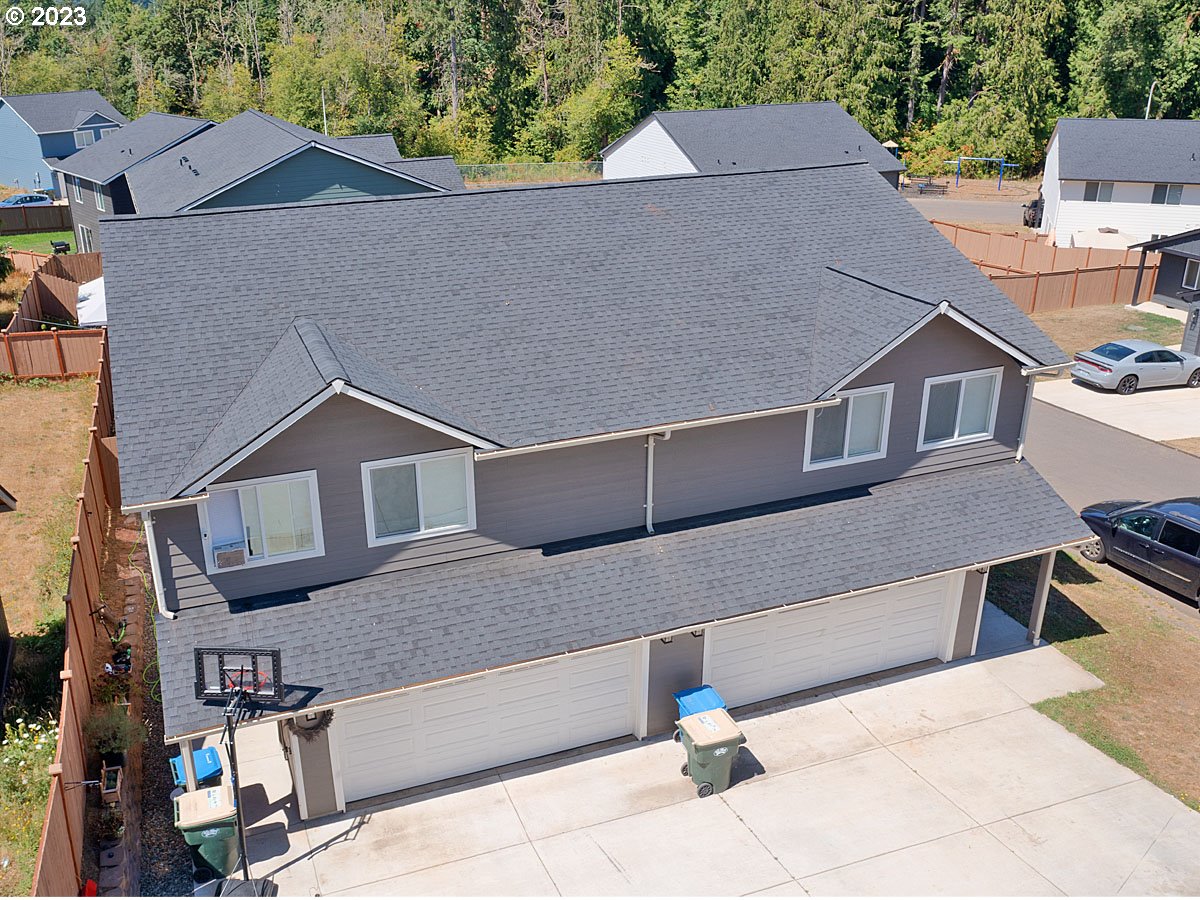 306 Oak Street Winlock, WA 98596 - Photo 7 of 35 an aerial view of a house with a yard