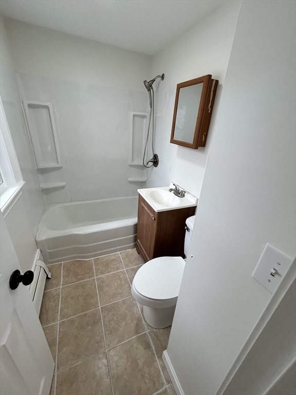 0 Main Street, Unit 1 Brockton, MA 02301 - Photo 3 of 9 a bathroom with a toilet sink and shower