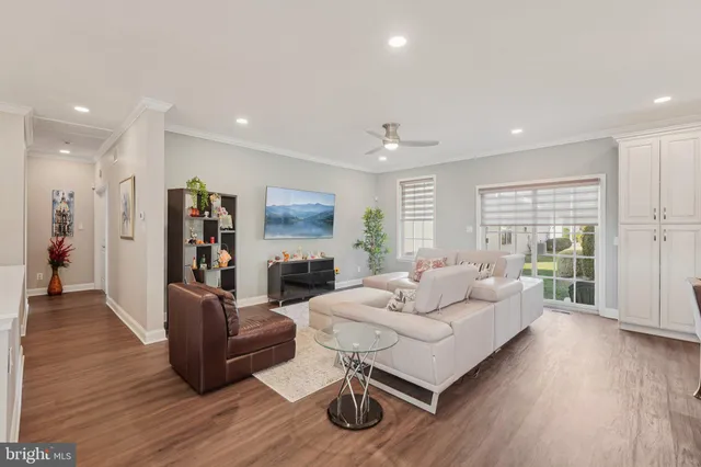 a large white kitchen with lots of counter top space