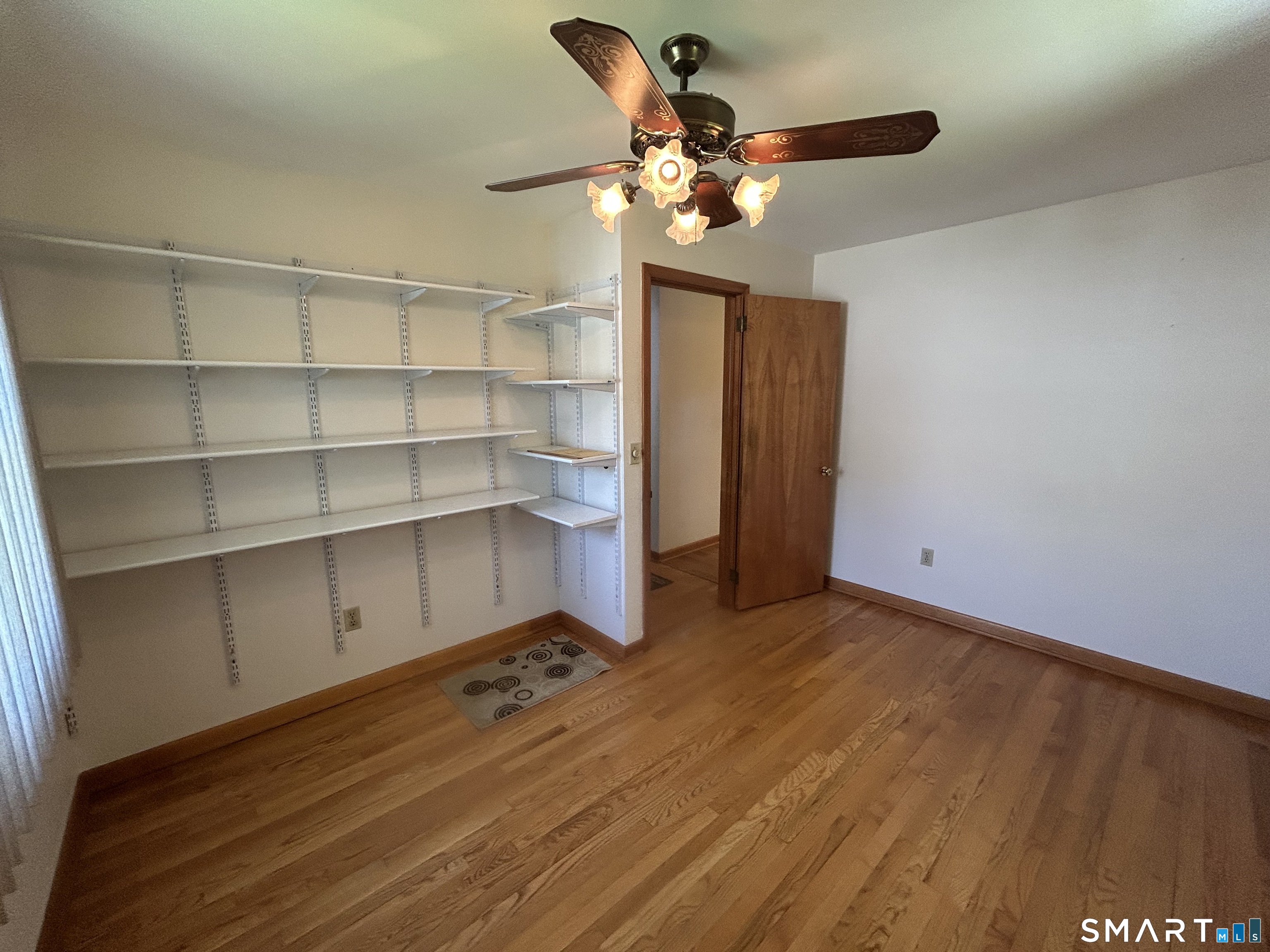 13 Walnut Lane Wallingford, CT 06492 - Photo 12 of 27 a view of an empty room with a window