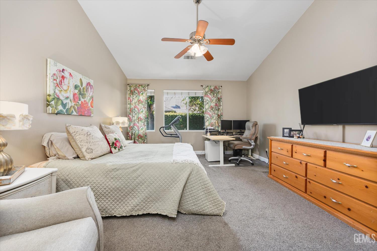 Undisclosed Address Bakersfield, CA 93311 - Photo 25 of 39 a bedroom with a bed and a flat screen tv