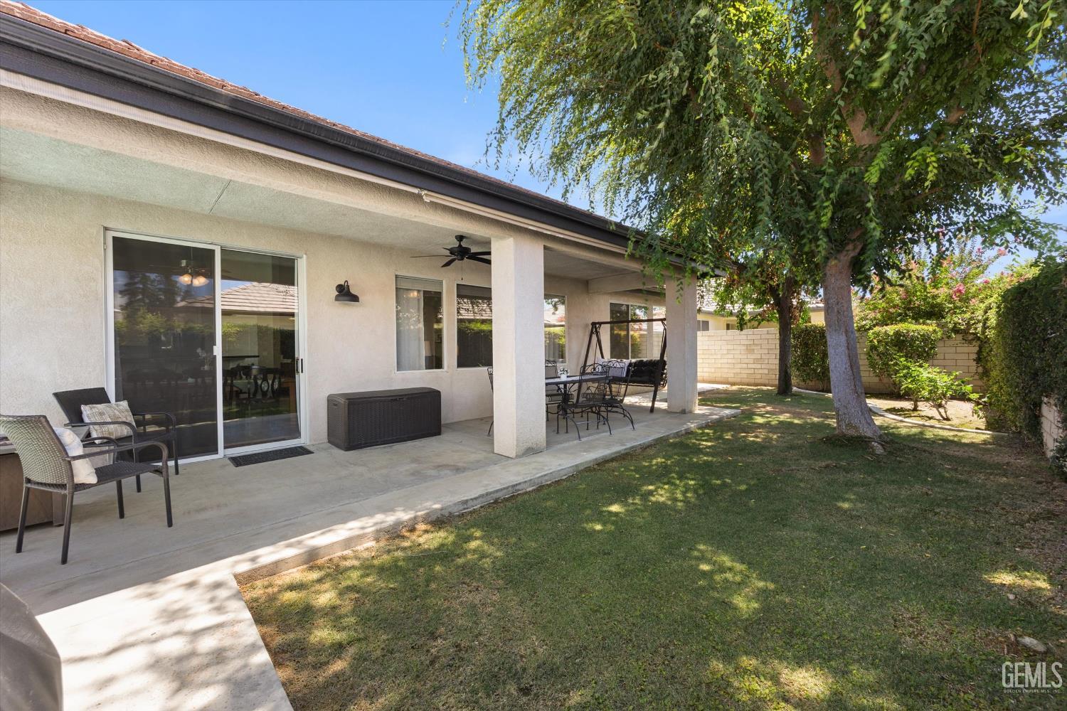 Undisclosed Address Bakersfield, CA 93311 - Photo 35 of 39 a view of a house with backyard porch and sitting area