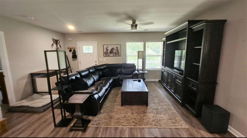 2956 Westmoreland Road Cleveland, GA 30528 - Photo 10 of 22 a living room with furniture window and a flat screen tv