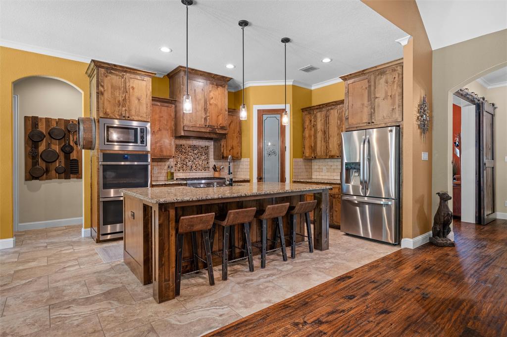 119 Rasha Drive Azle, TX 76020 - Photo 6 of 40 Gourmet Kitchen Granite counter Extra Storage