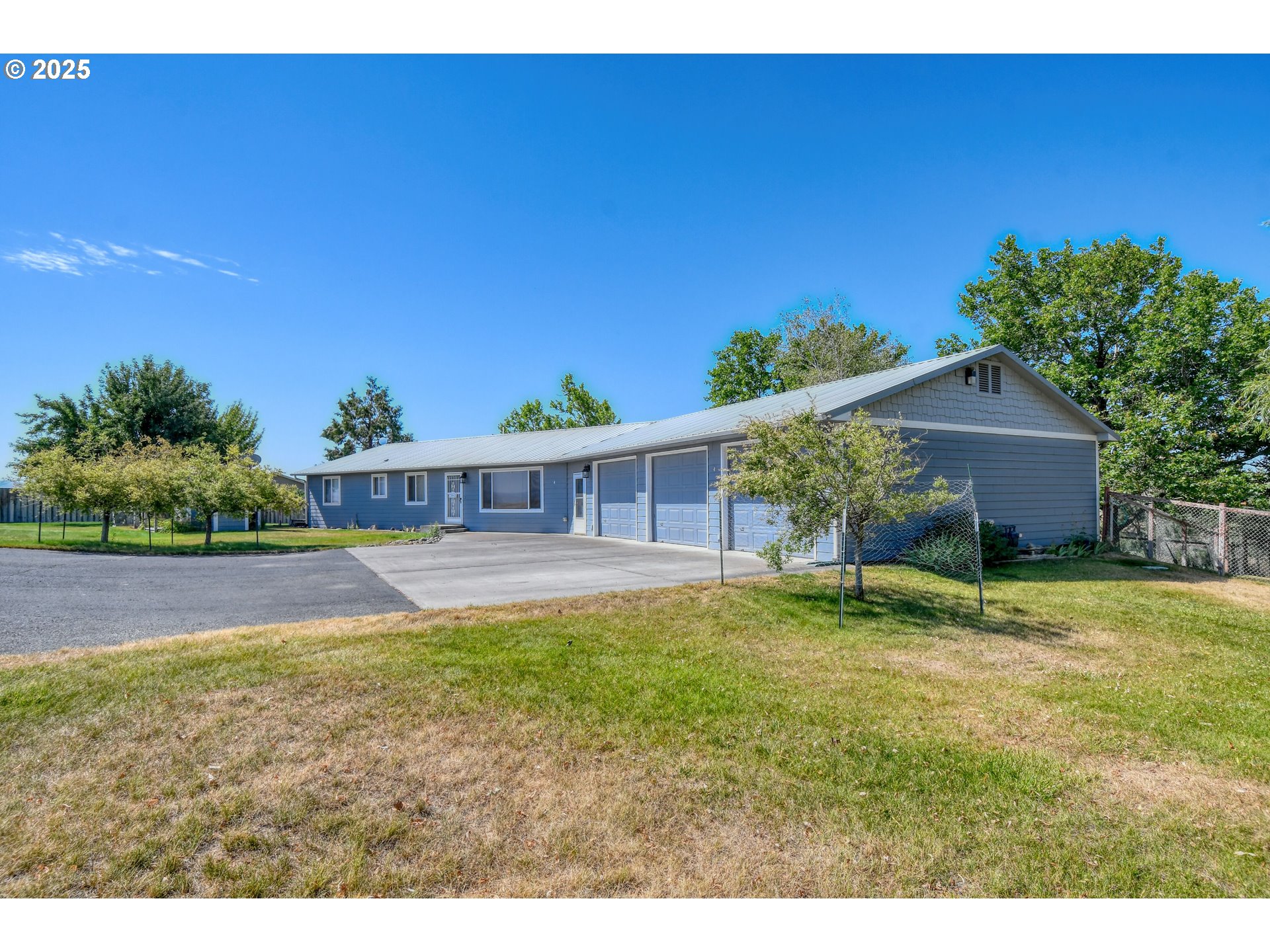 72062 Westfield Boulevard Pendleton, OR 97801 - Photo 1 of 48 a view of a house with a yard