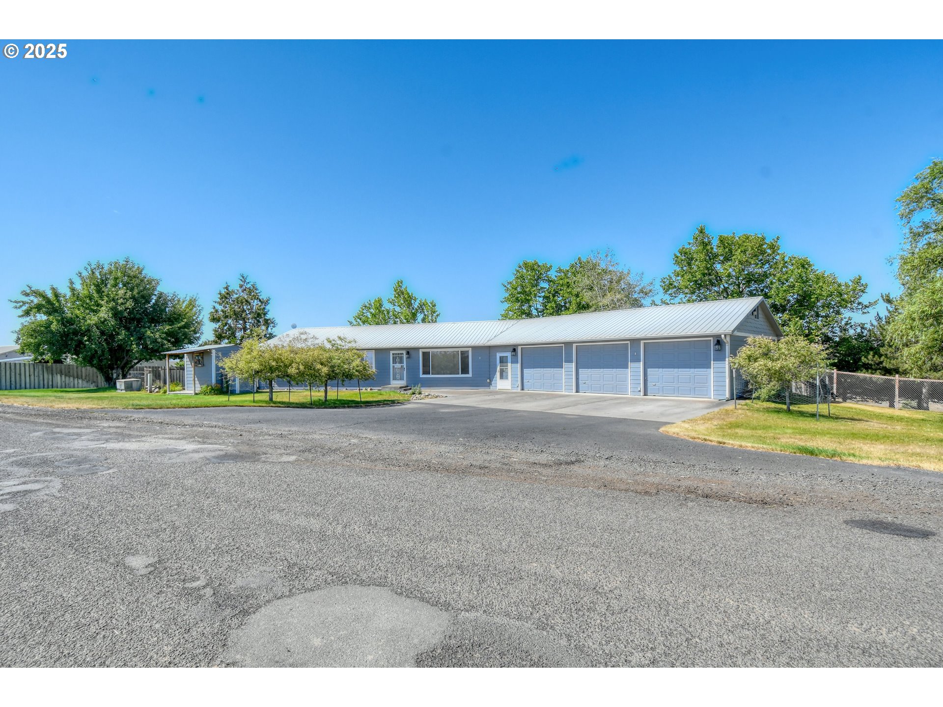 72062 Westfield Boulevard Pendleton, OR 97801 - Photo 2 of 48 a view of house with outdoor space and swimming pool
