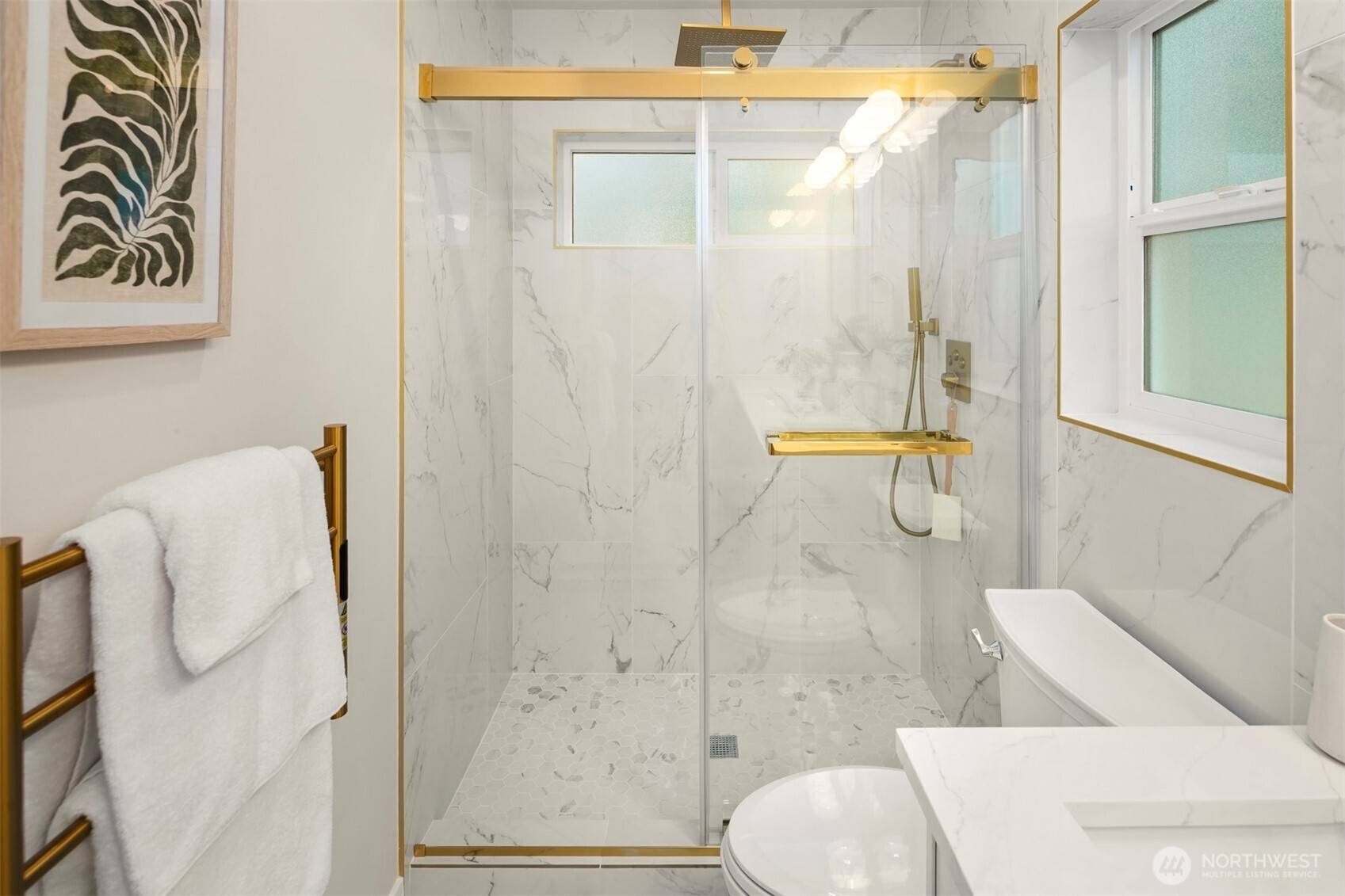 9205 Evanston Avenue North Seattle, WA 98103 - Photo 15 of 21 a bathroom with a shower and toilet