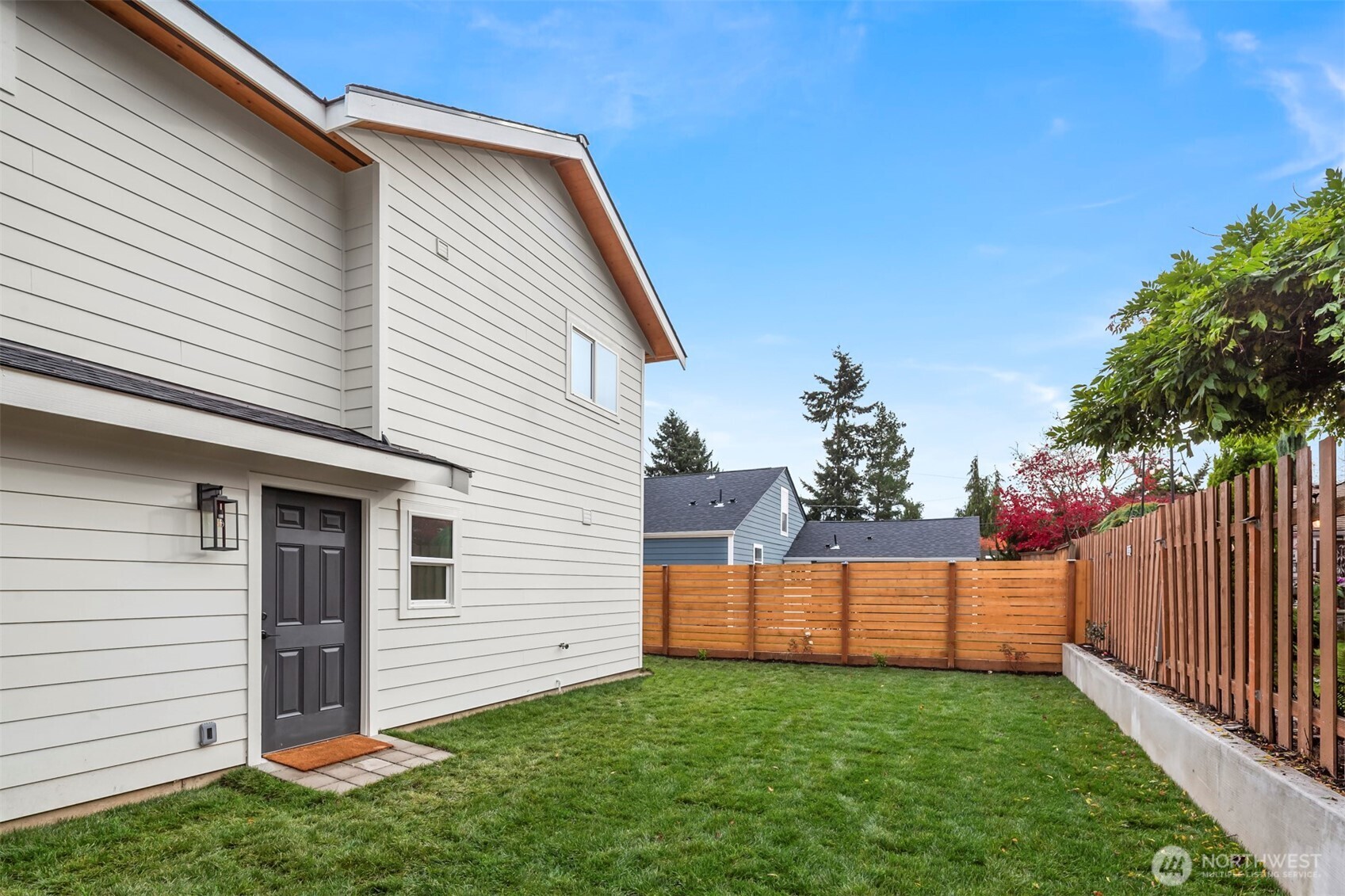 9205 Evanston Avenue North Seattle, WA 98103 - Photo 19 of 21 a view of a backyard with a garden