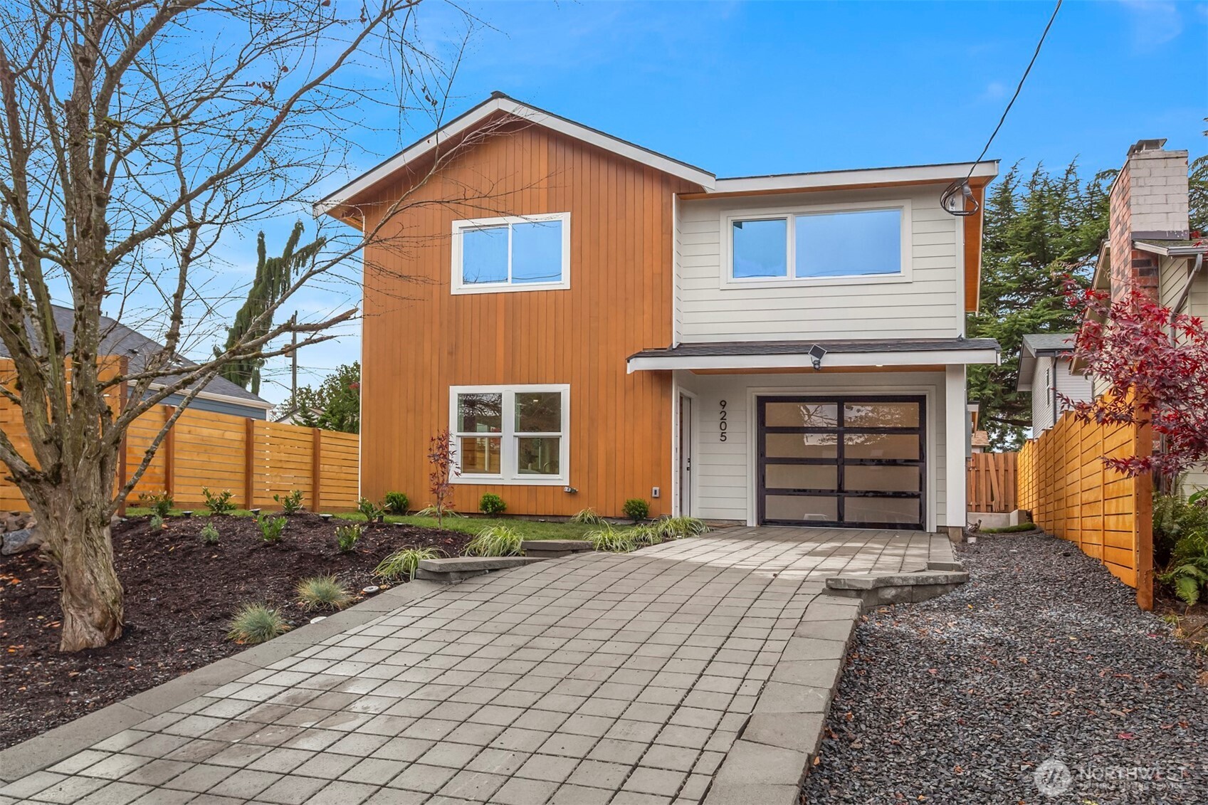 9205 Evanston Avenue North Seattle, WA 98103 - Photo 21 of 21 a front view of a house with a yard