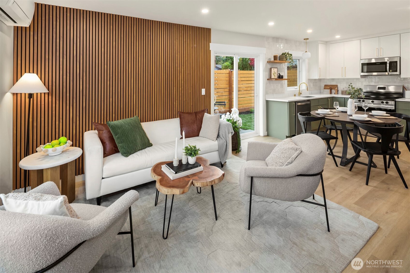 9205 Evanston Avenue North Seattle, WA 98103 - Photo 3 of 21 a living room with furniture and a table