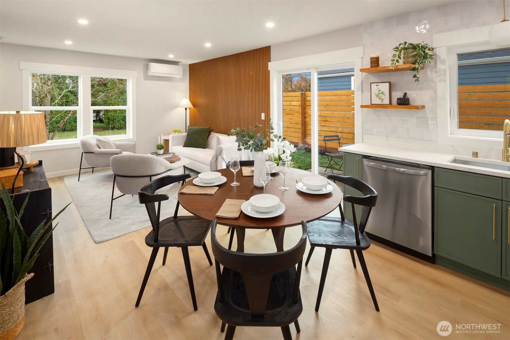 9205 Evanston Avenue North Seattle, WA 98103 - Photo 5 of 21 a view of a dining room with furniture and window
